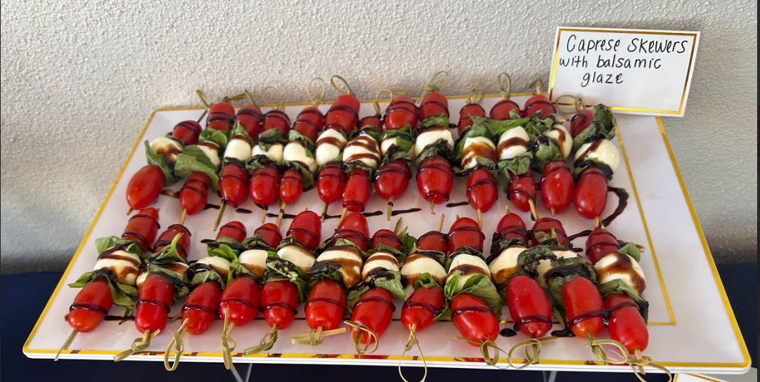 Caprese skewers with tomato mozzarella basil and balsamic glaze